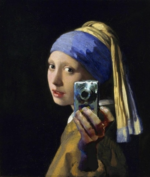 Girl with a digital camera