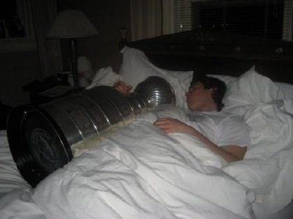 Sidney Crosby sleeping with the Stanley Cup