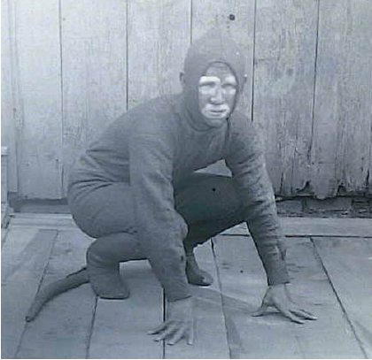 A crouching man, from Black and WTF blog